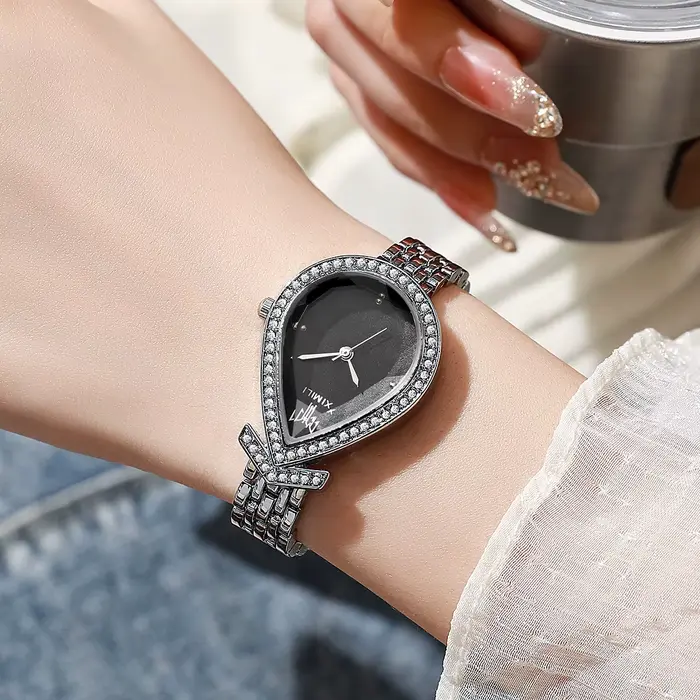 Nouvelle montre créative vintage pour femmes avec cadran en forme de larme serti de diamants