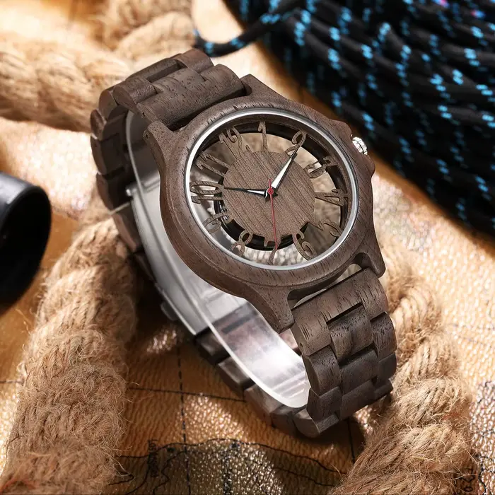 Montre à quartz en bois de style creux pour hommes et femmes