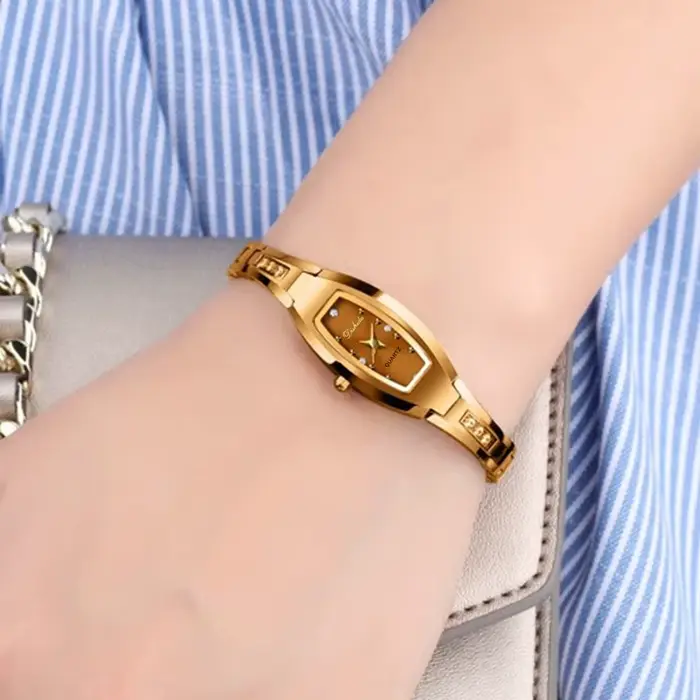 Montre rétro dorée pour femmes Vintage petites dames montres Bracelet en acier