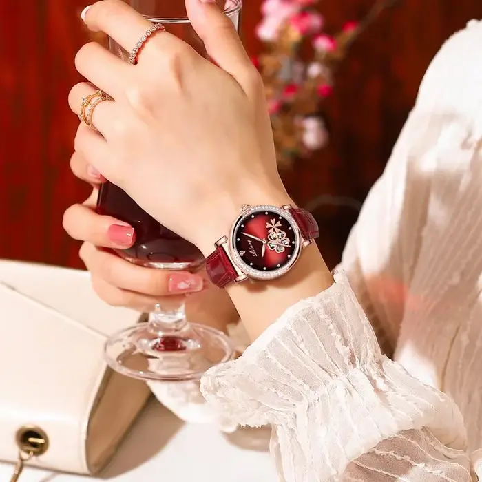 Nouvelle Montre Femme Rotative à Fleurs