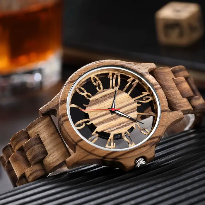 Montre à quartz en bois de style creux pour hommes et femmes