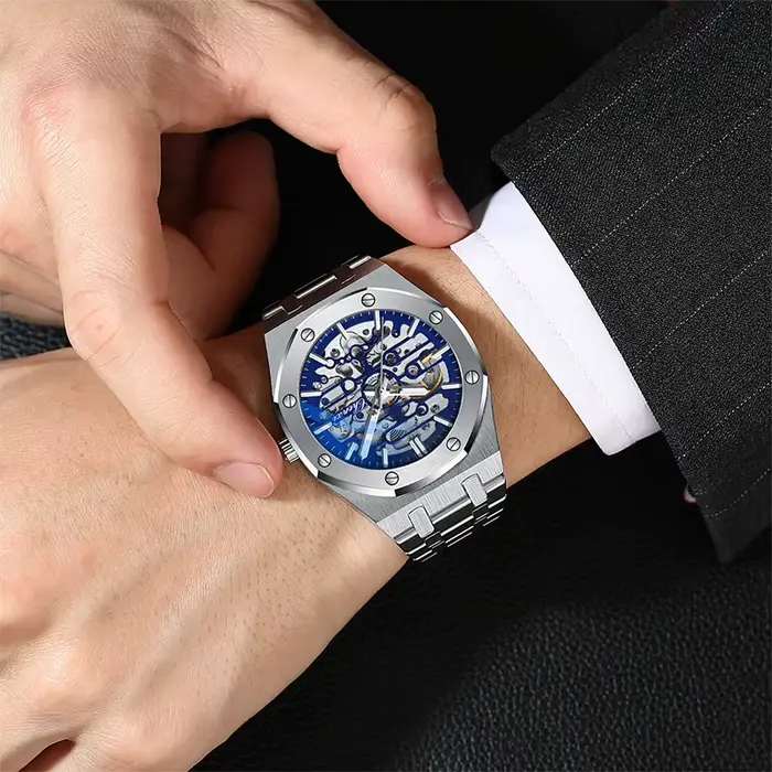 CHENXI haut de gamme évider entièrement automatique montres mécaniques pour hommes argent noir bracelet en acier inoxydable montre pour homme 2025