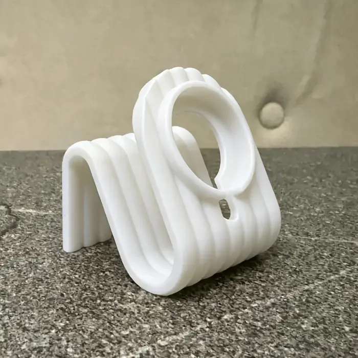 Station de charge pour Apple Watch au design minimaliste ondulé