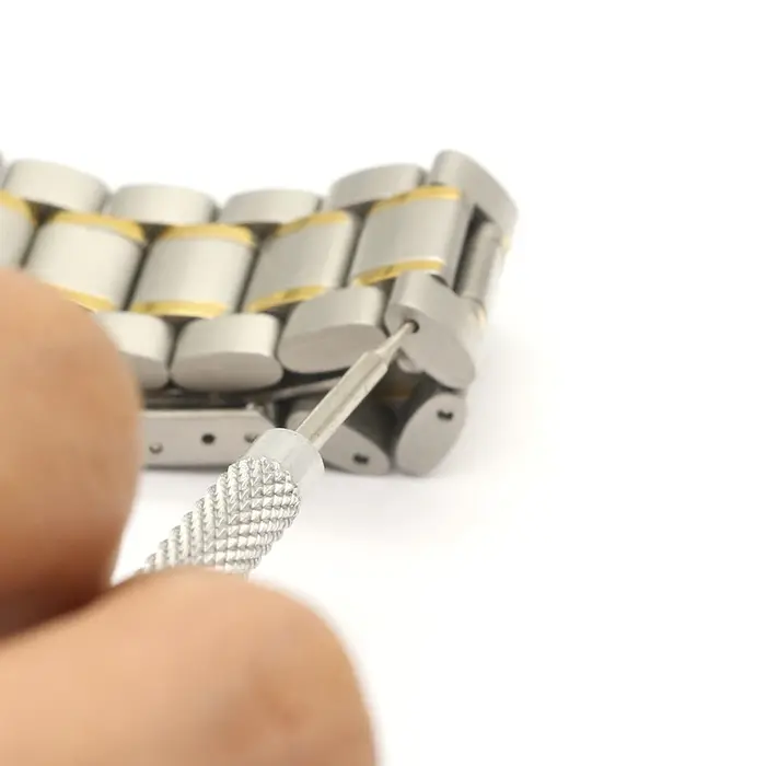 Outil de réparation de bracelet de montre en métal