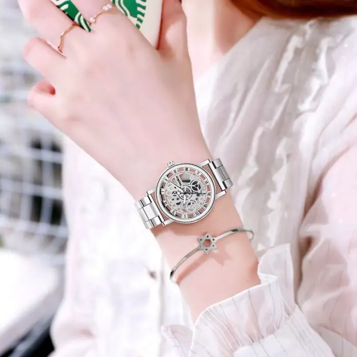 Top nouvelle mode femmes creux squelette Faux montre mécanique dames métal maille Quartz montres pour femme Relogio Feminino