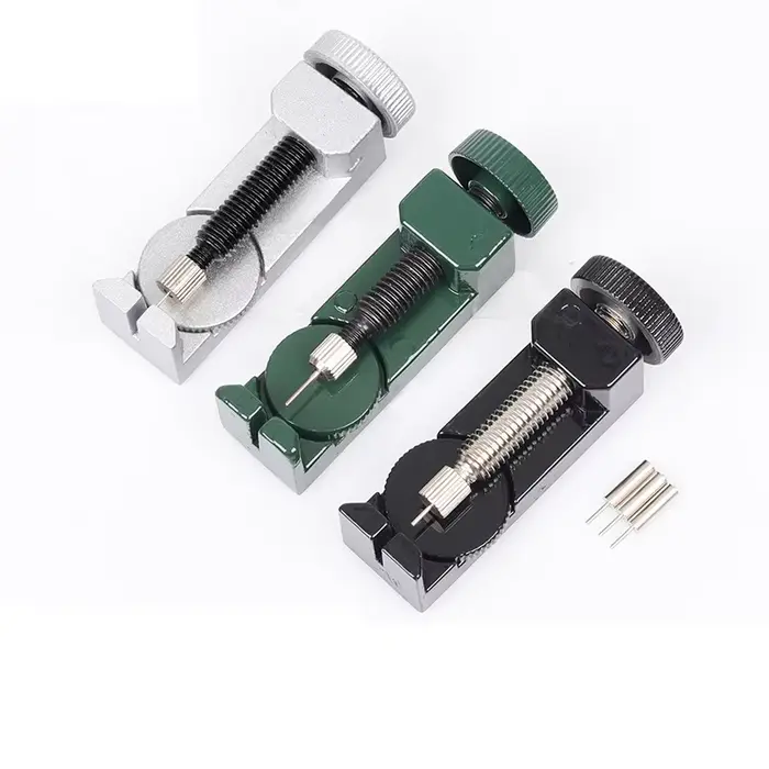Ajusteur de bracelet de montre avec goupille