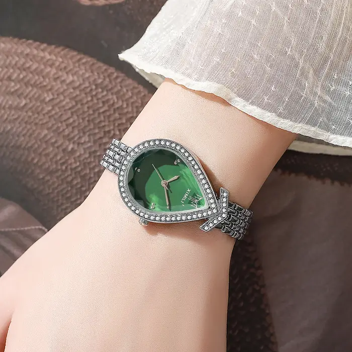 Nouvelle montre créative vintage pour femmes avec cadran en forme de larme serti de diamants