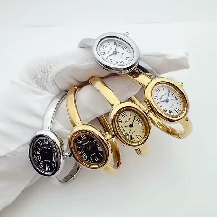 Marque de luxe femmes Rome cadran Montre à Quartz mode or couleurs bracelet montre-bracelet Relogio Feminino livraison