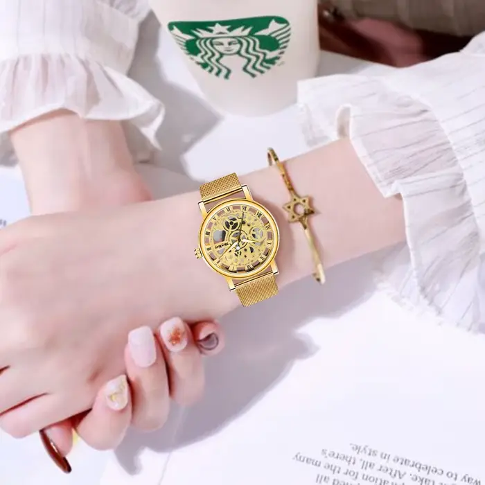 Top nouvelle mode femmes creux squelette Faux montre mécanique dames métal maille Quartz montres pour femme Relogio Feminino