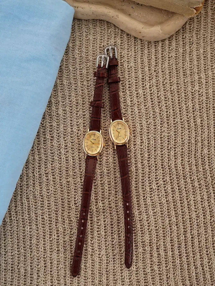 1 Nouvelle Montre à Quartz Dorée pour Femmes, Style Rétro Luxe, Boîtier Ovale et Bracelet en Cuir, Montre Élégante et Polyvalente pour Femmes.