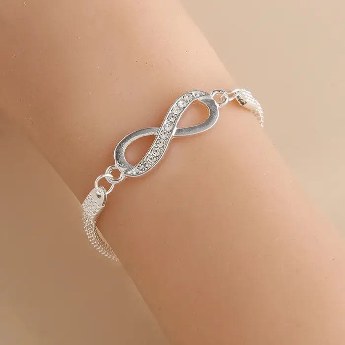 Bracelet en alliage avec strass en forme de croix
