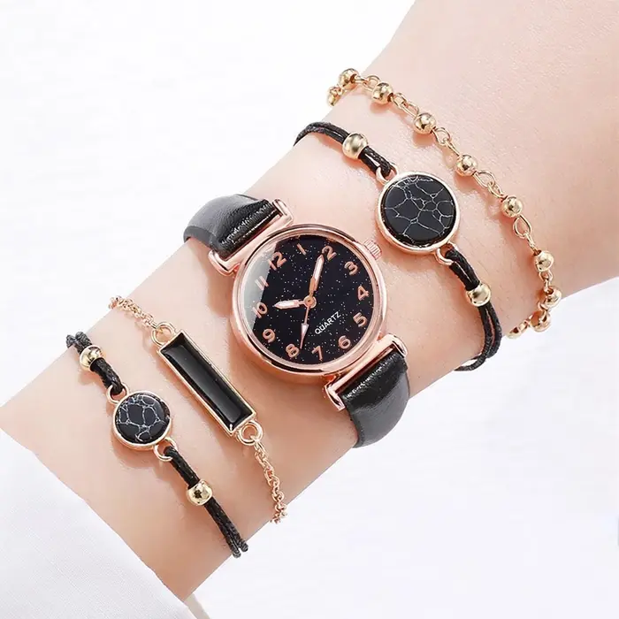 Montre à quartz avec bracelet en cuir et cadran ciel étoilé pour femme
