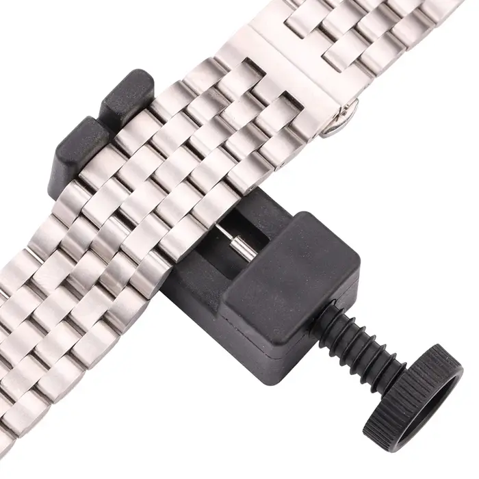 Outil de réparation et de réglage de maillons de bracelet de montre