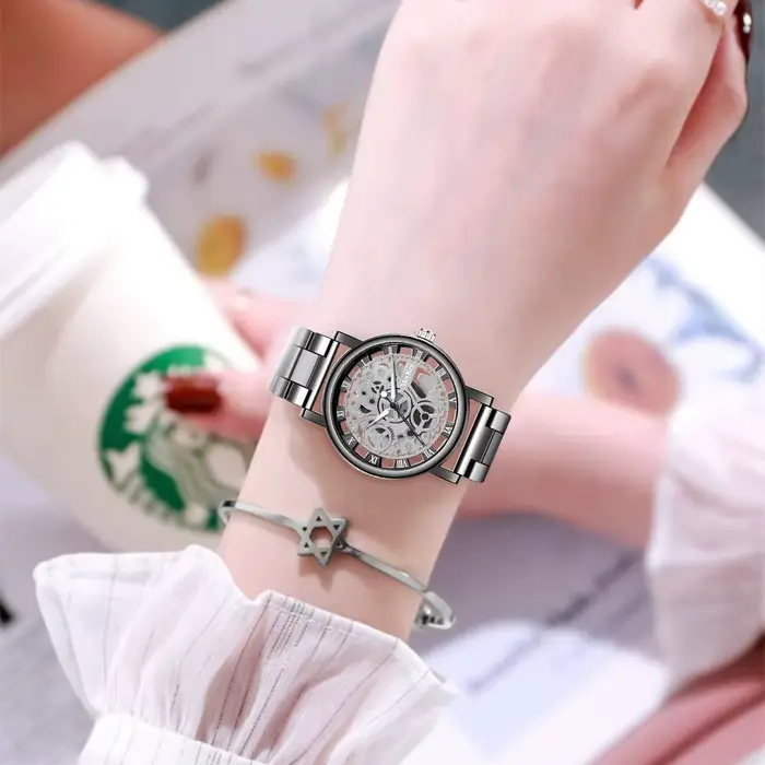 Top nouvelle mode femmes creux squelette Faux montre mécanique dames métal maille Quartz montres pour femme Relogio Feminino