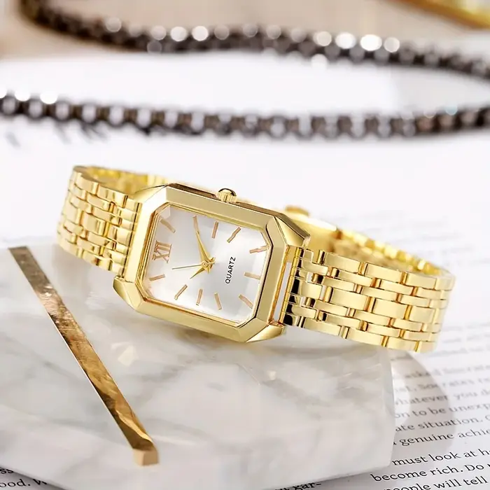 Montre de luxe élégante pour femmes, boîtier doré, bracelet en acier, mouvement à Quartz avec chiffres romains, accessoire de mode pour dames