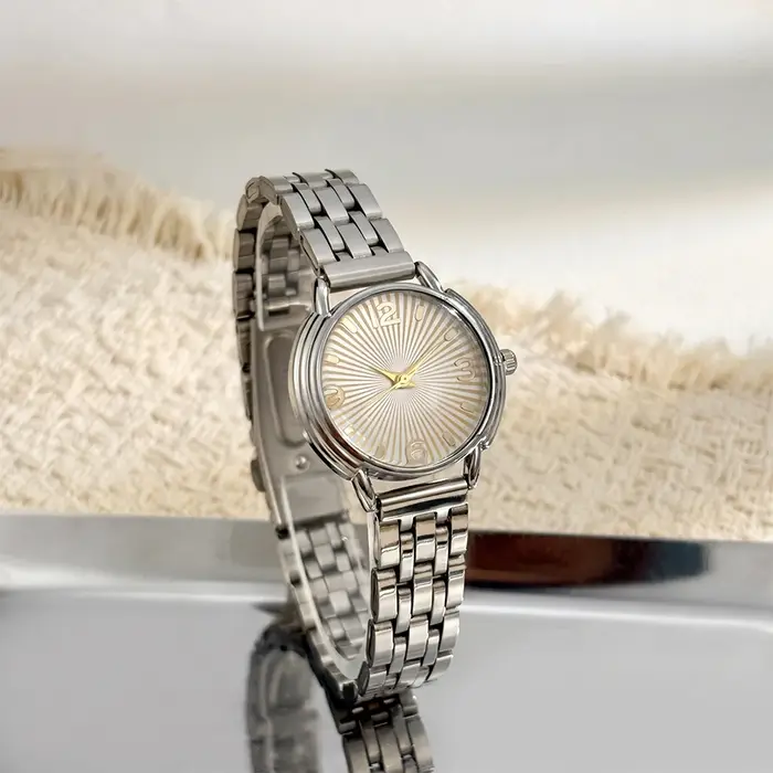 Montre en or pour femme : cadran rond effet soleil, bracelet en acier inoxydable, montre-bracelet de luxe légère