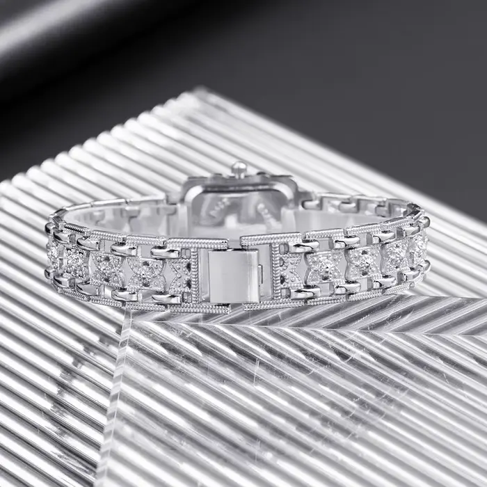 Femmes montre Rectangle cadran argent acier inoxydable cristal montres mode Quartz