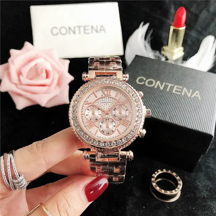 Montre à quartz en acier inoxydable avec biscuits pour femme