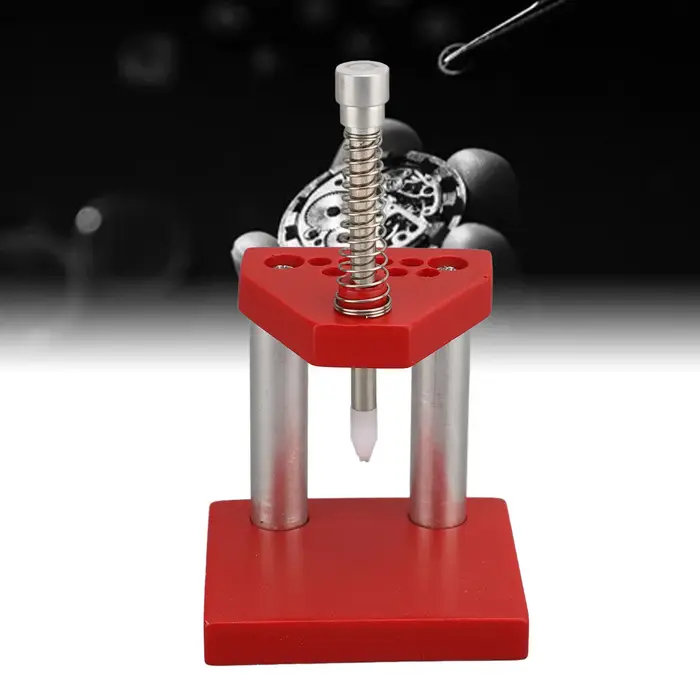 Outil de pressage de montre avec embouts fixes